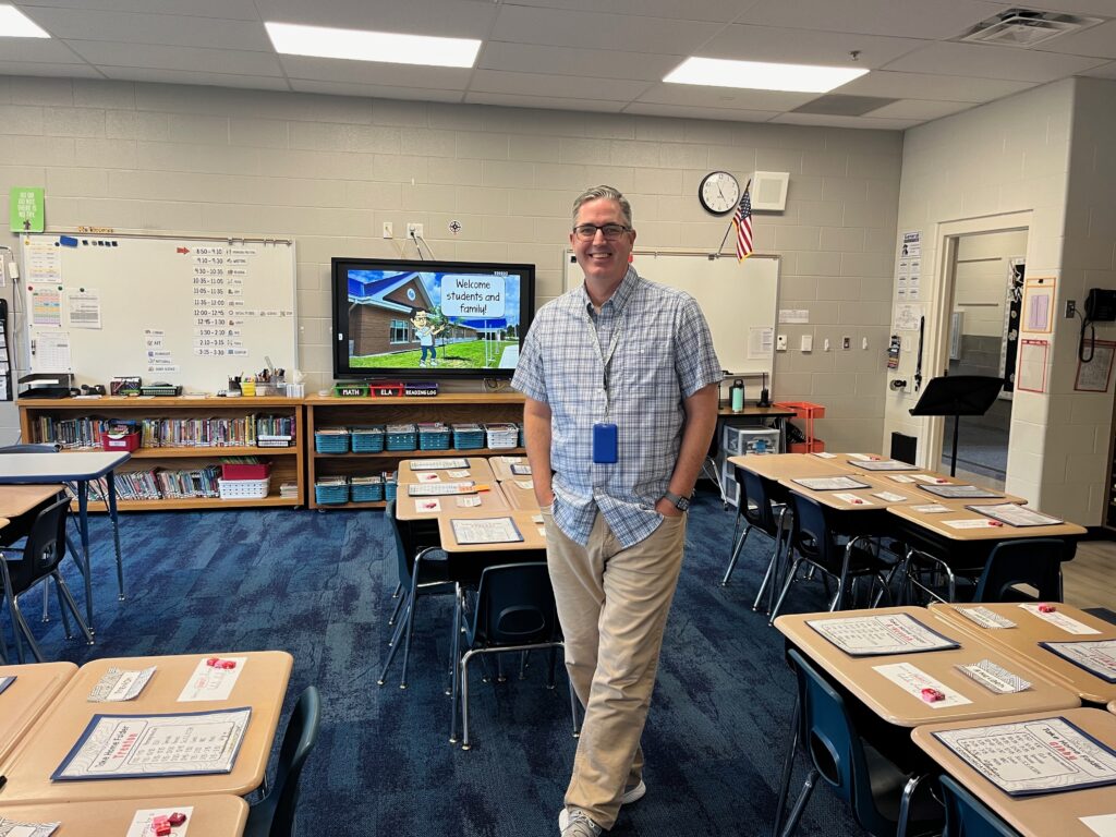 Shane in his classroom